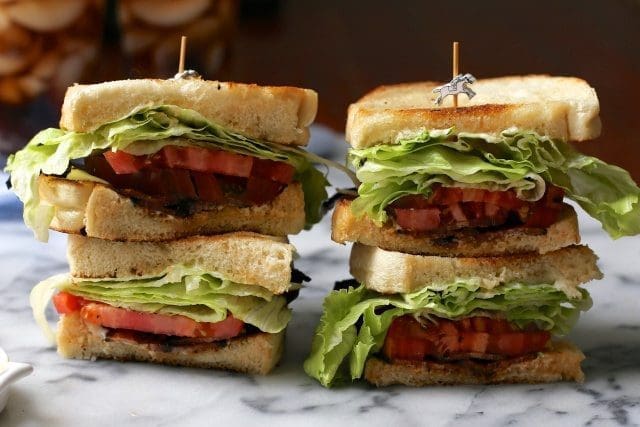 bacon lettuce tomato sandwich with a toothpick
