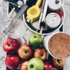 Tray of apple pie ingredients and supplies