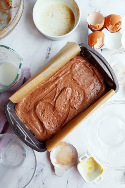 Araby Spice Cake recipe batter in a loaf pan for baking.