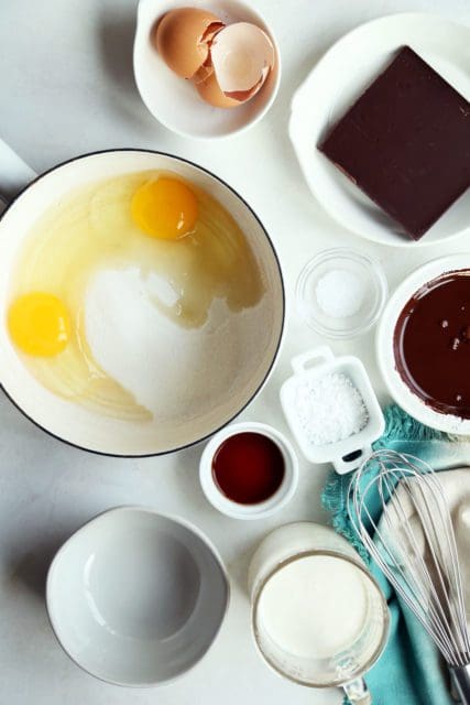 Small saucepan with eggs and sugar for french silk pie recipe filling
