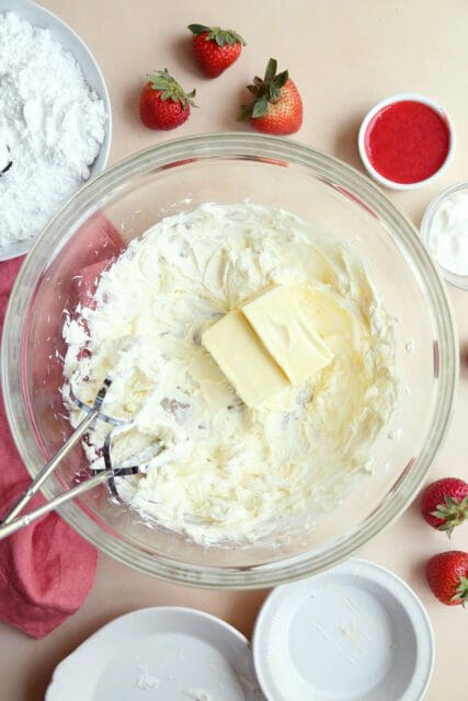 cream cheese frosting ingredients in large bowl.