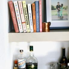 Stack of cookbooks on shelf