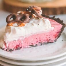 Slice of fluffy, creamy cranberry pie on a small plate.