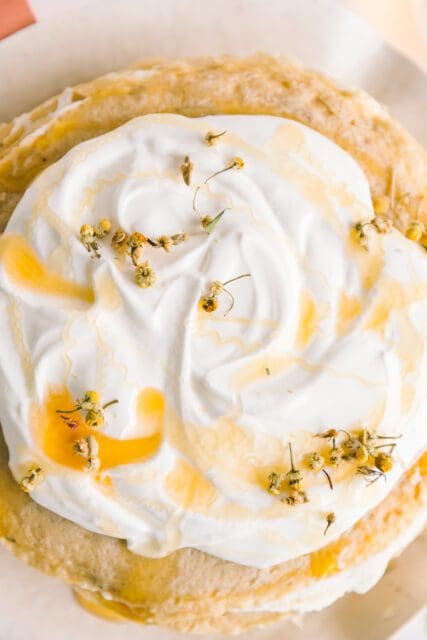 top of crepe cake with chamomile honey swirled whipped cream